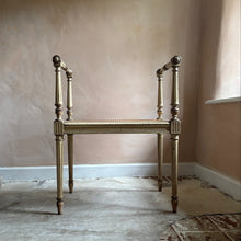 Load image into Gallery viewer, 19th Century French window seat with remnants of original paint and a new cane seat by Penlen