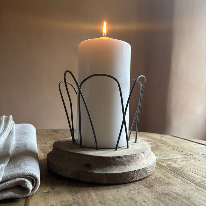 Large Swedish Antique Candle Holder on a wooden kitchen table by Penlen 