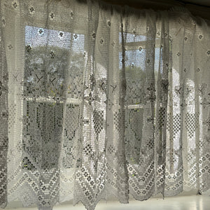 hand worked French Antique Crocheted Lace Curtains in white in a cottage window by Penlen 